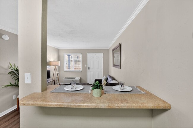 Dine and Relax in the Open-Concept Living Area at Seminole Flatts