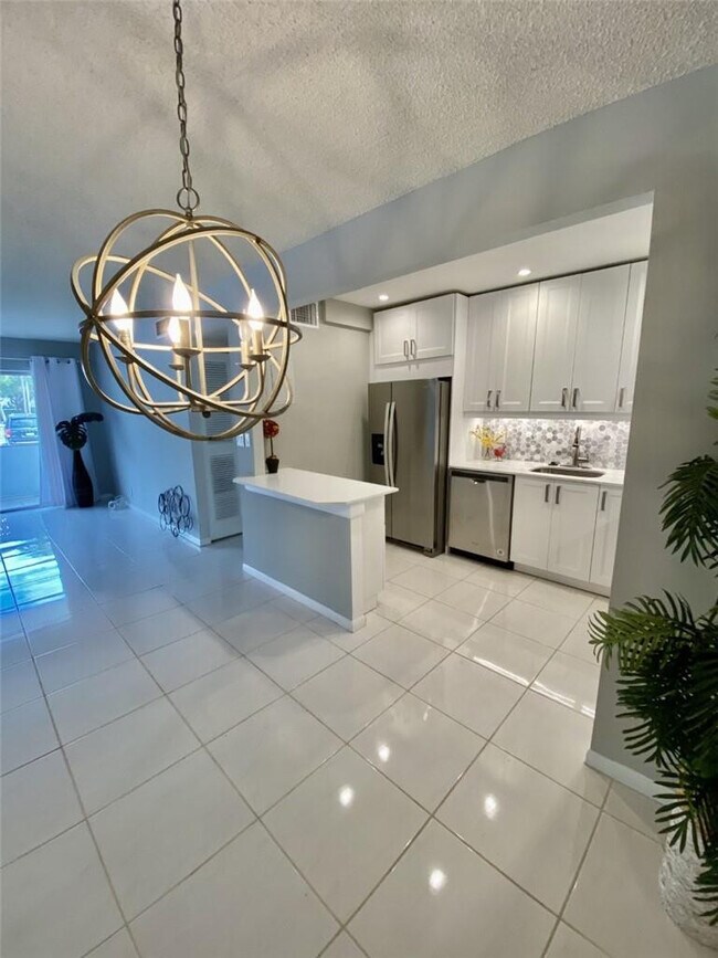 Building Photo - 21 Jacaranda Dr Unit 124