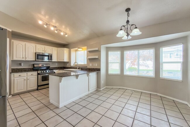 Photo - Comfortable 4 bed, 3 bath Family Home With Garage & Pet-Friendly Living! - Available NOW!