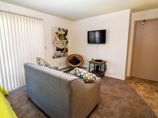 Living Room in Studio Floor Plan - Eastland Apartments