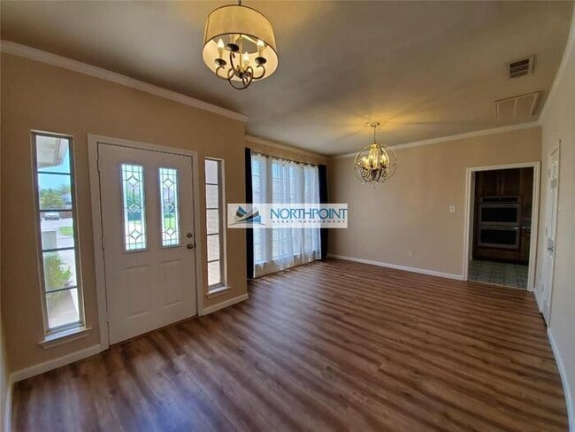 Photo - Stunning corner lot home with beautiful pool and upgrades throughout.