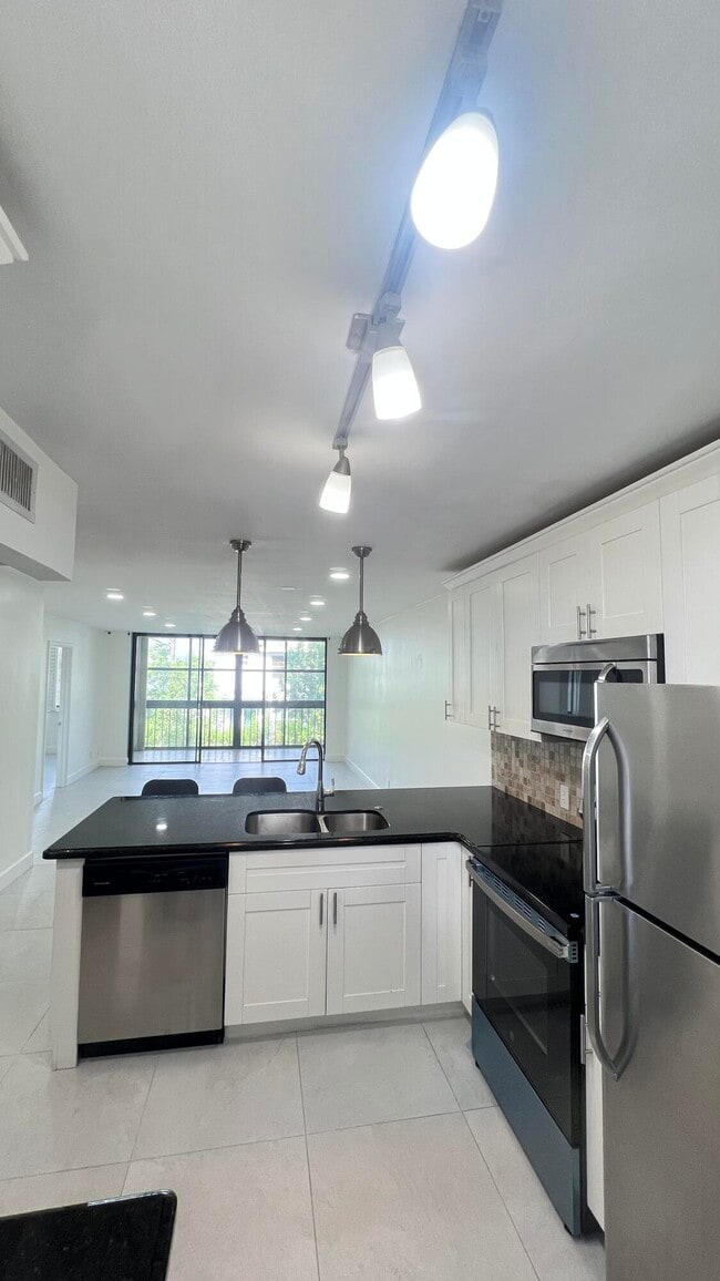 Building Photo - 4381 Trevi Ct Unit 206