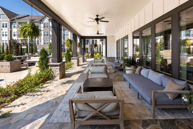 Shade, fans and deep seating, for the afternoons that stay outside.