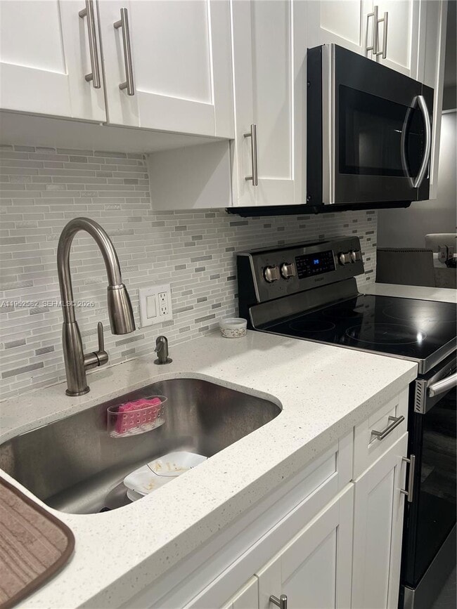 Building Photo - 3675 N Country Club Dr Unit 2408