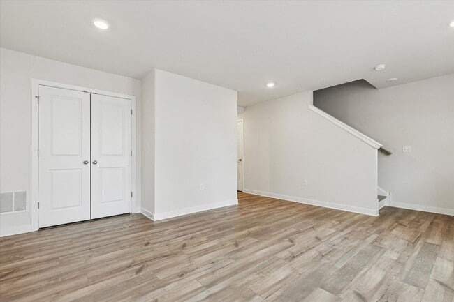 Photo - COMING SOON! Brand New River Pointe townhome with modern finishes, flexible living space, and a p...