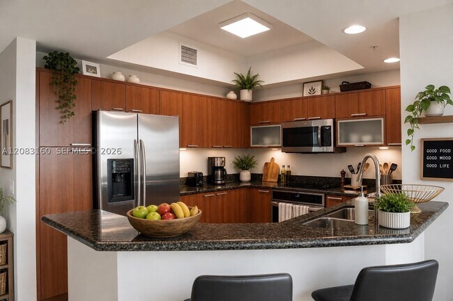 Building Photo - 15051 Royal Oaks Ln Unit 1104