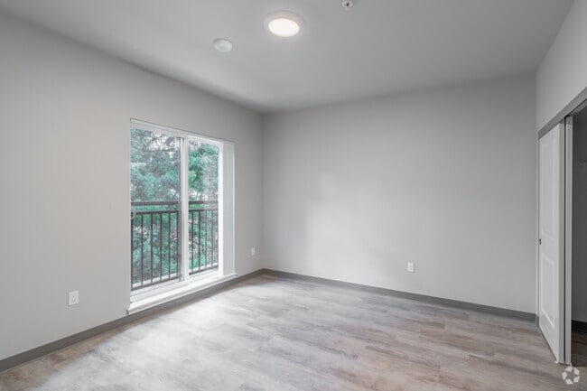 2BR, 1BA - 794SF - Primary Bedroom - Opera House