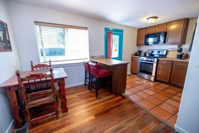 Photo - Modern Comfort with Fireplace & Yard | 2BR...