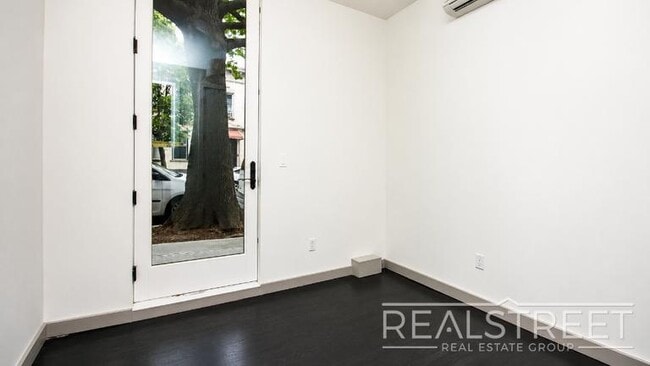 Photo - Brand-New 2-Bedroom Duplex with Private Basement & Premium Amenities Unit 1B