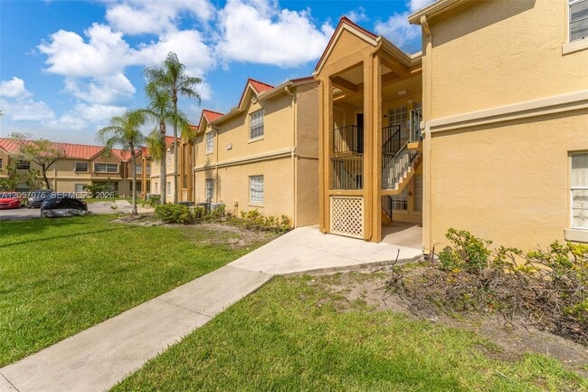 Building Photo - 18336 NW 68th Ave Unit G