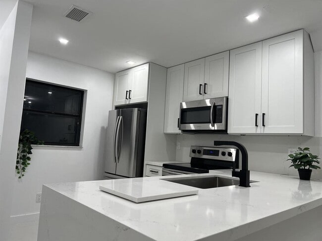 Building Photo - 1088 NW 106th Ter Unit 206