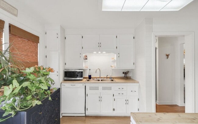 Photo - "Charming 2-Bedroom Duplex with Cozy Firep...