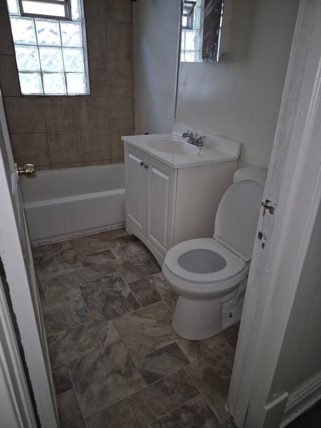 Photo - Spacious 4-Bedroom Upper Duplex with Yard