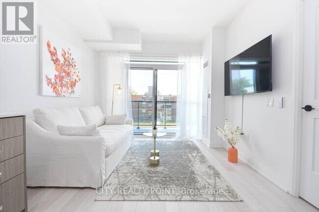 Photo - 50 George Butchart Dr Unit 211