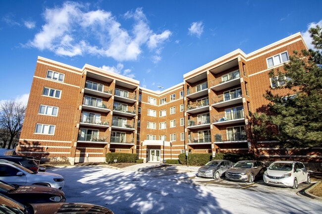 Building Photo - 6430 W Berteau Ave Unit 210