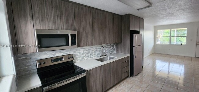 Photo - 605 W 68th St Unit 23