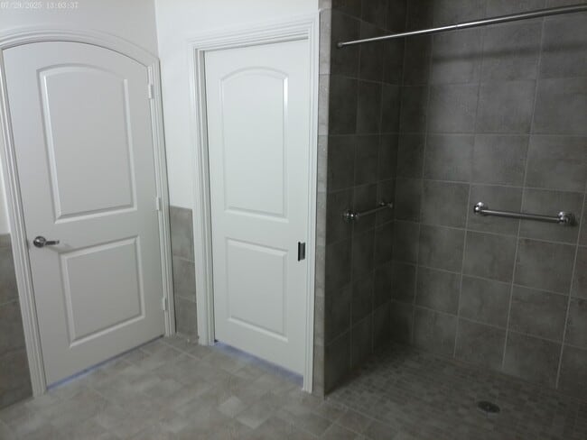 Bathroom door leading to bedroom and main room