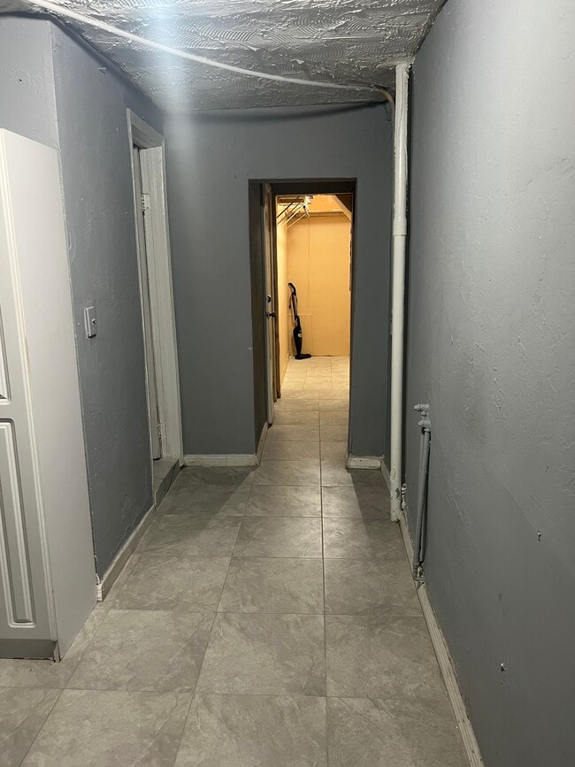 Hallway leads you to restroom & bedroom.. - 1030 NW 120th St Unit 1030