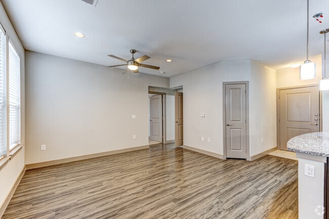 1BR, 1BA - 786SF - Living Room - Regalia Bella Terra apartments