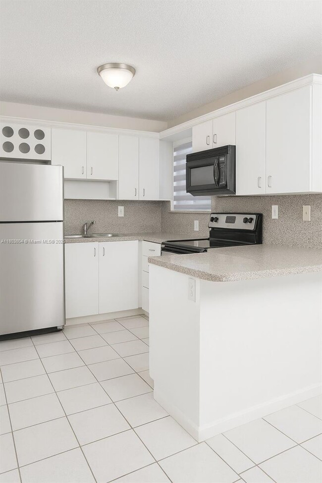 Building Photo - 8170 NW 10th St Unit 2 Rental
