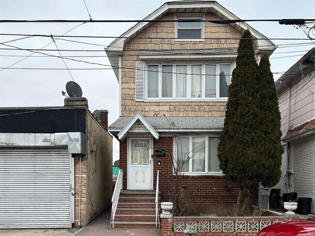 Photo - 1696 E 49th St Townhome