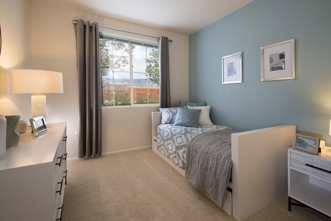 Renovated Package II bedroom with dual closets and carpeting