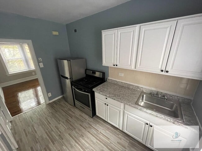 Building Photo - 4235 N Lamon Ave Unit 4245 - 2S
