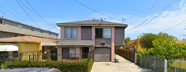 Building Photo - 13230 Cordary Ave Unit 312