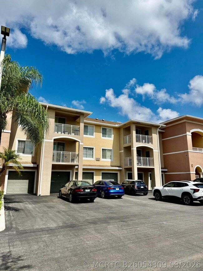 Building Photo - 6529 Emerald Dunes Dr Unit 302
