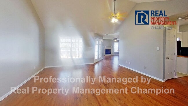 Photo - Charming home with open floor plan, vaulted ceilings and spacious backyard