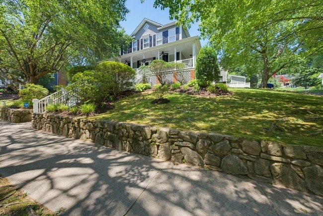 Building Photo - Southern Charm Meets Everyday Entertainment and Convenience!