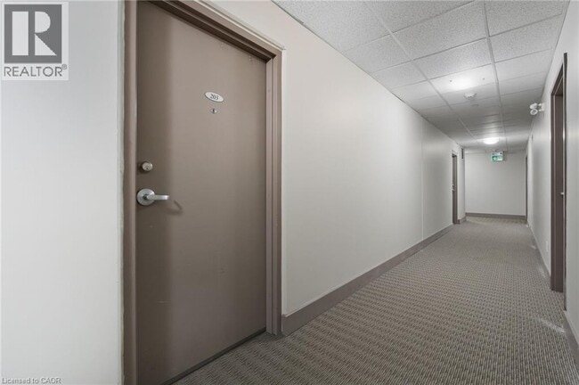 Photo - 149 Main St W Unité 203