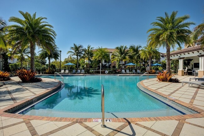 Resort Style Swimming Pool with Sunning Deck - Atlantico At Palm Aire Apartments