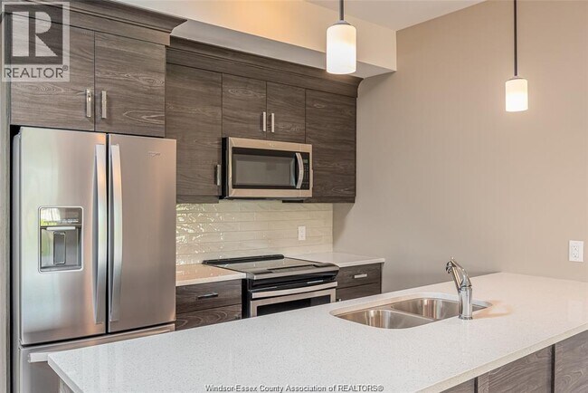 Photo - 5840 Newman Blvd Unité 210