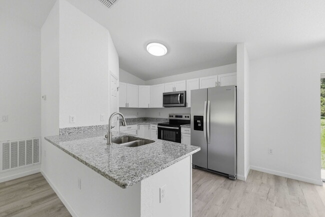 Photo - Available Now! New 3/2 Home with Large Backyard and Front Porch