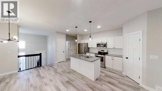 10410-10128 128 Ave