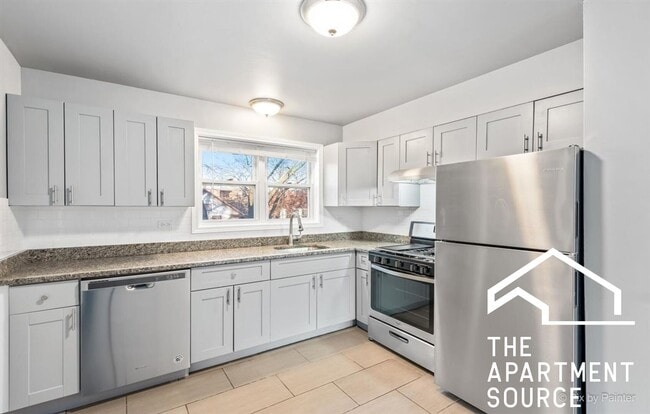 Building Photo - 7439 N Winchester Ave Unit 207