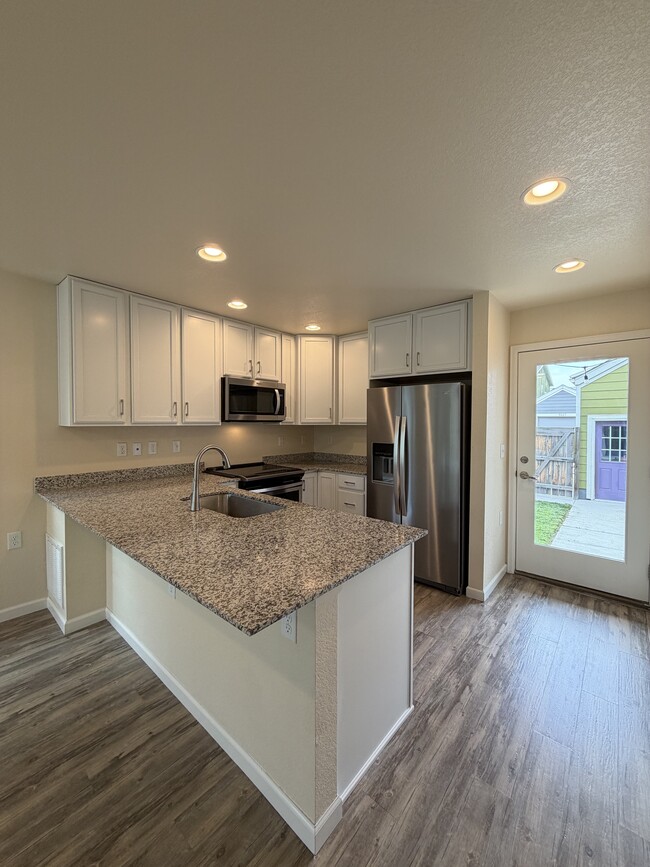 Photo - 9320 E 58th Ave