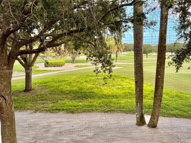 Building Photo - 200 Jacaranda Country Club Dr Unit 4B