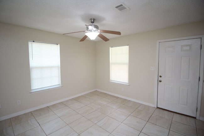 Photo - West Pensacola Duplex Living — 3BR Home with Open Floor Plan, Eat-In Kitchen, Covered Patio & Low... Unit C