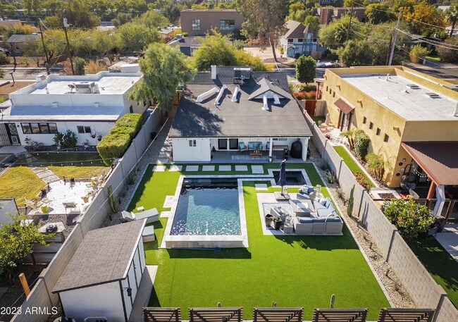 Aerial view of fully remodeled backyard (patio set not included) - 928 E Whitton Ave House
