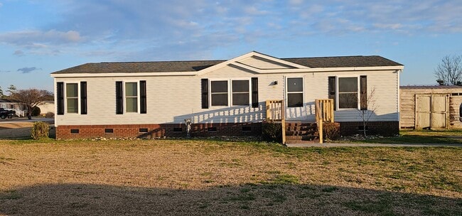 Photo - Spacious 3-bedroom, 2-bathroom mobile home. Showings Coming Soon!
