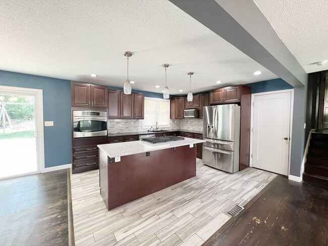 Photo - COMING SOON: Charming 3-Bedroom Home with Modern Kitchen & Spacious Backyard!