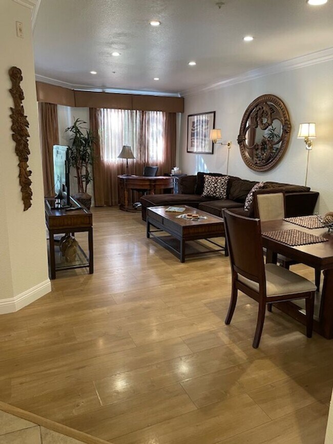 Photo - Meridian 2 Bd / 2 Ba with Laminate Flooring in Living Room & Bedroom Areas