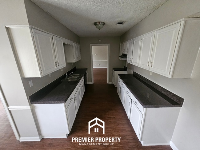 Photo - Spacious 3BR/2BA Home in 38115 | Vaulted Ceilings, 2-Car Garage & Back Deck