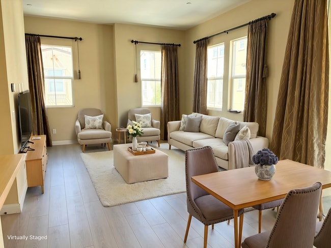 Building Photo - Stylish 3-Story Townhome with Balcony & Open-Concept Living
