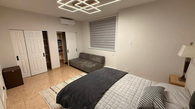 Photo - "Charming 1-Bedroom Furnished Apartment with Hardwood Floors in Queens – 750 Sq Ft of Comfort!"