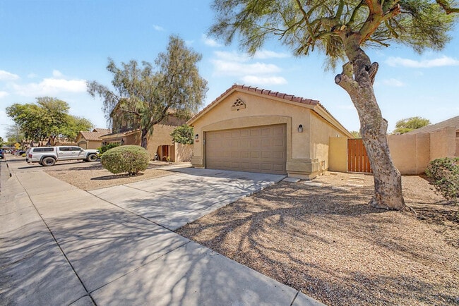7043 W Phelps Rd