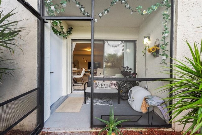 Building Photo - 10710 Royal Palm Blvd Unit 2-2