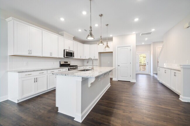 Building Photo - Available 08/15! Spacious Townhome in Prime Andrew Chapel Community